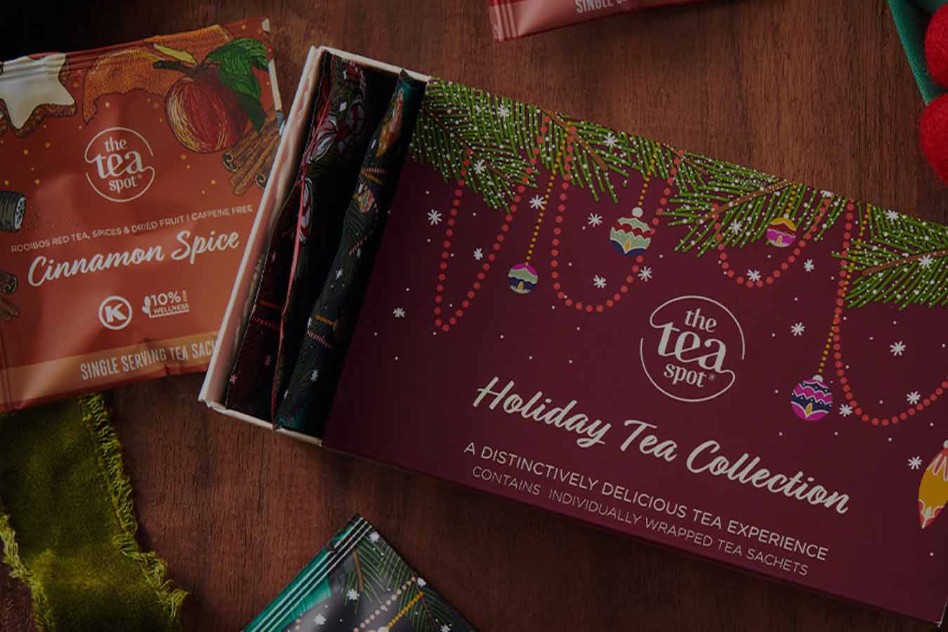 a box reads Holiday tea collection with holiday teas surrounding it
