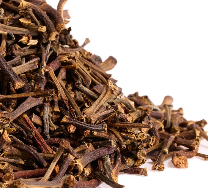 A pile of ceylon cinnamon tea on a clean white background.
