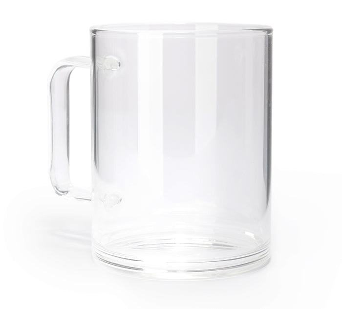 a clear glass tea mug on white background