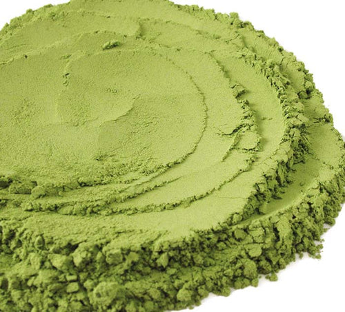 Organic Matcha Tea green tea powder in a circle on a white background