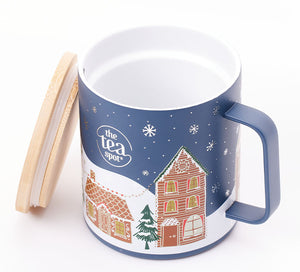 a metal camping mug with bamboo lid has a holiday painting on the outside