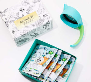 mocktail kit for dry january six teas in pouches with a lid for cold brewing tea in teal on a white background