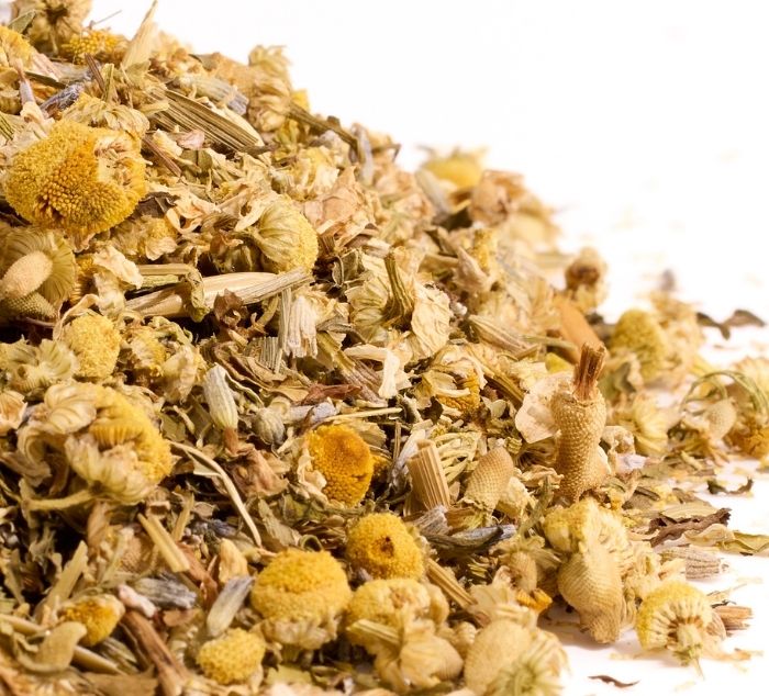 loose leaf tea ingredients for sweet dreams on a white background