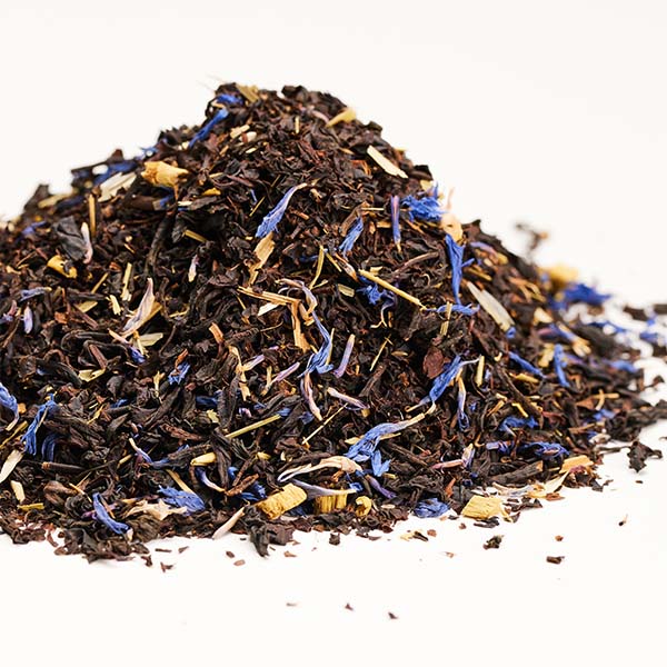 a pile of black tea with cornflower and oatstraw