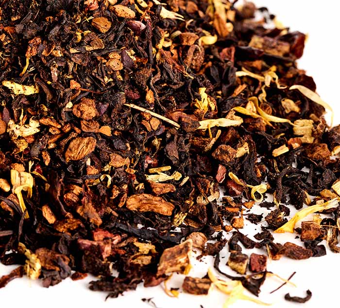 a pile of loose leaf black tea with mushrooms and digestive herbs