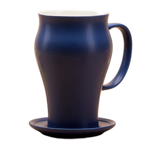 dark blue tea mug on saucer
