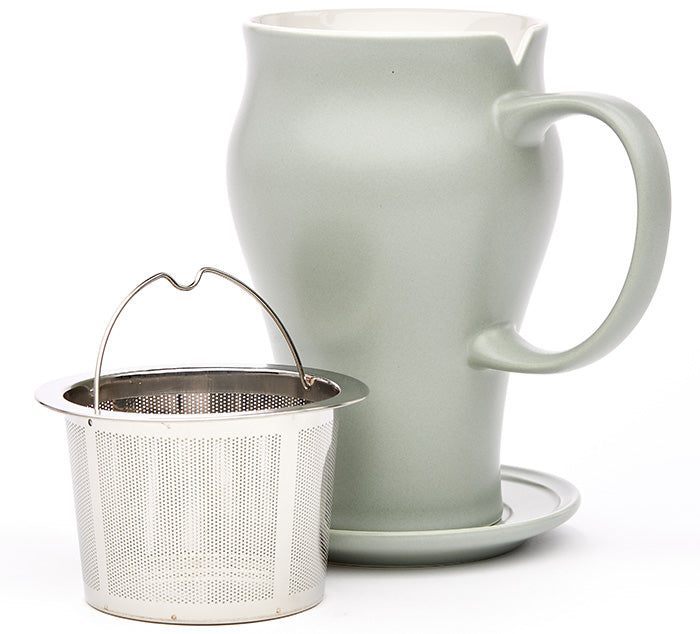 green ceramic tea mug